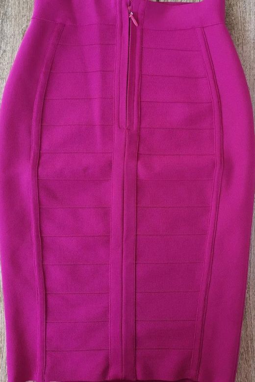 Woman wearing a figure flattering  Pencil High Waist Bandage Knee Length Cocktail Skirt - Magenta Pink BODYCON COLLECTION