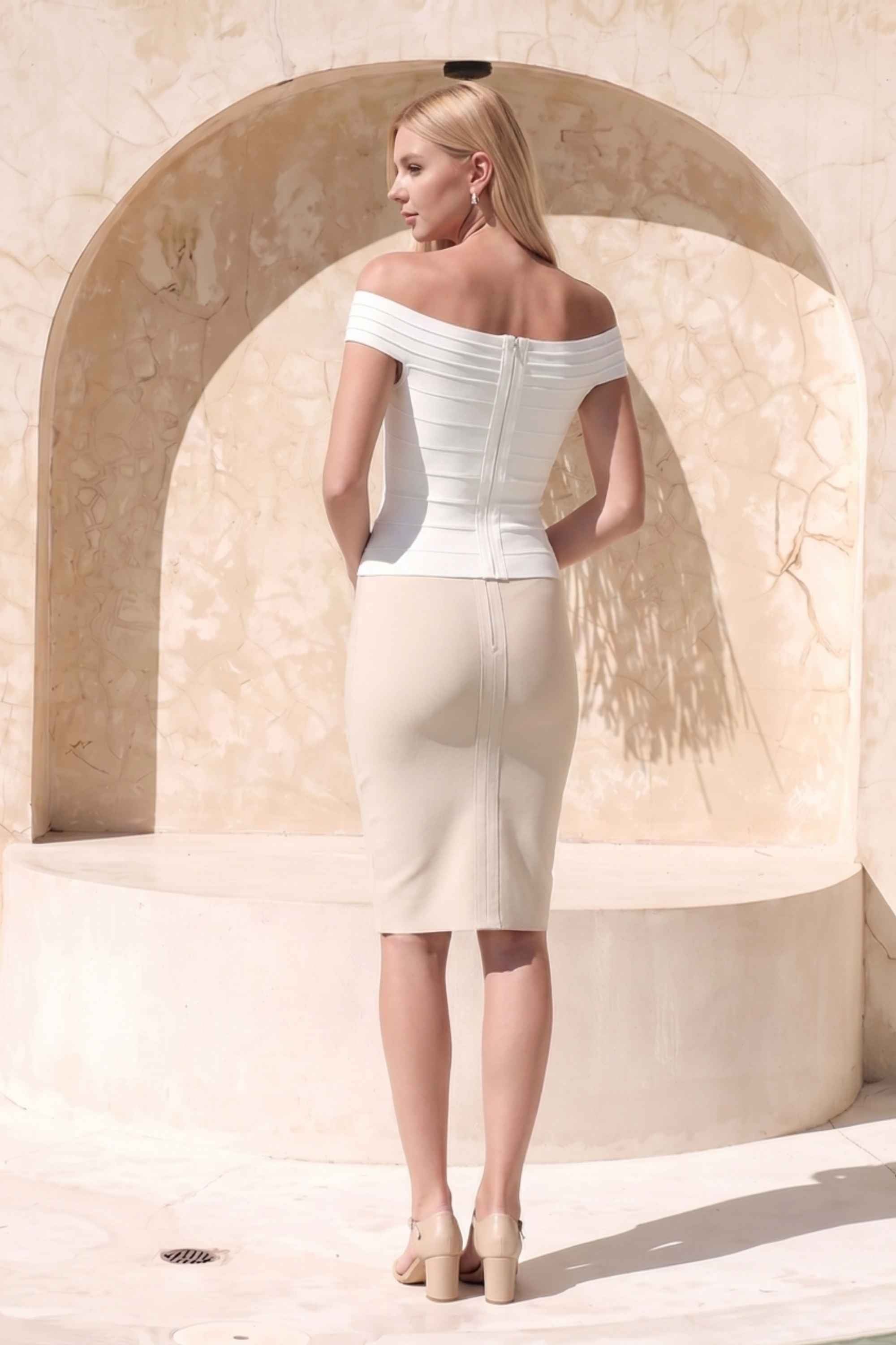 Woman wearing a figure flattering  Pencil High Waist Bandage Knee Length Skirt - Cream BODYCON COLLECTION