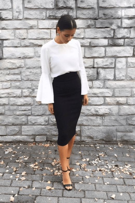 Woman wearing a figure flattering  Pencil High Waist Bandage Midi Skirt - Pearl White BODYCON COLLECTION