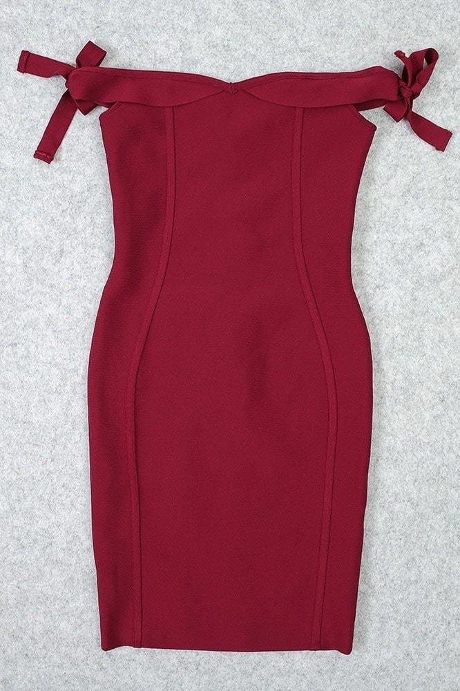 Woman wearing a figure flattering  Penelope Bandage Mini Dress - Red Wine BODYCON COLLECTION