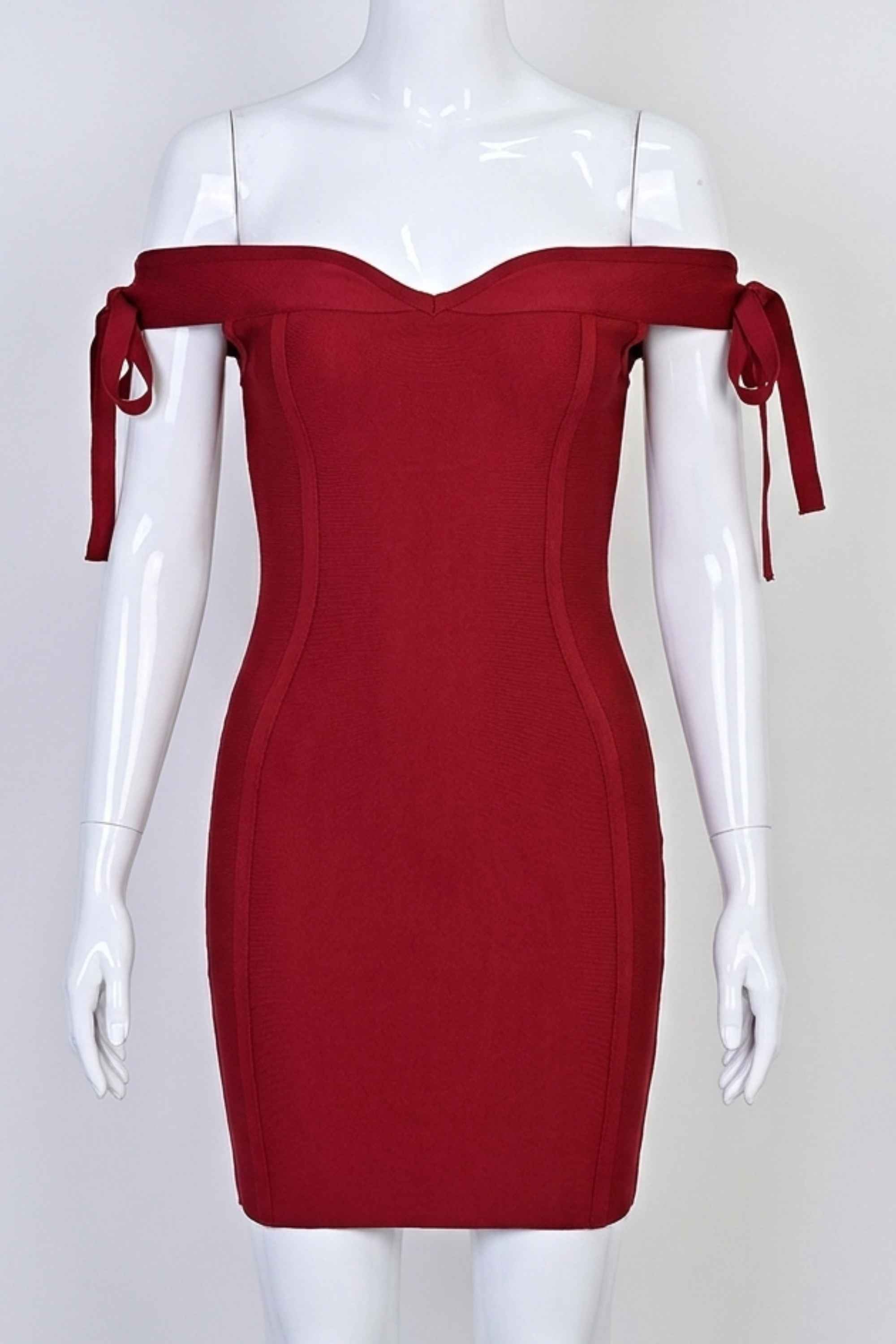 Woman wearing a figure flattering  Penelope Bandage Mini Dress - Red Wine BODYCON COLLECTION