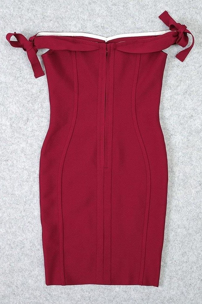 Woman wearing a figure flattering  Penelope Bandage Mini Dress - Red Wine BODYCON COLLECTION