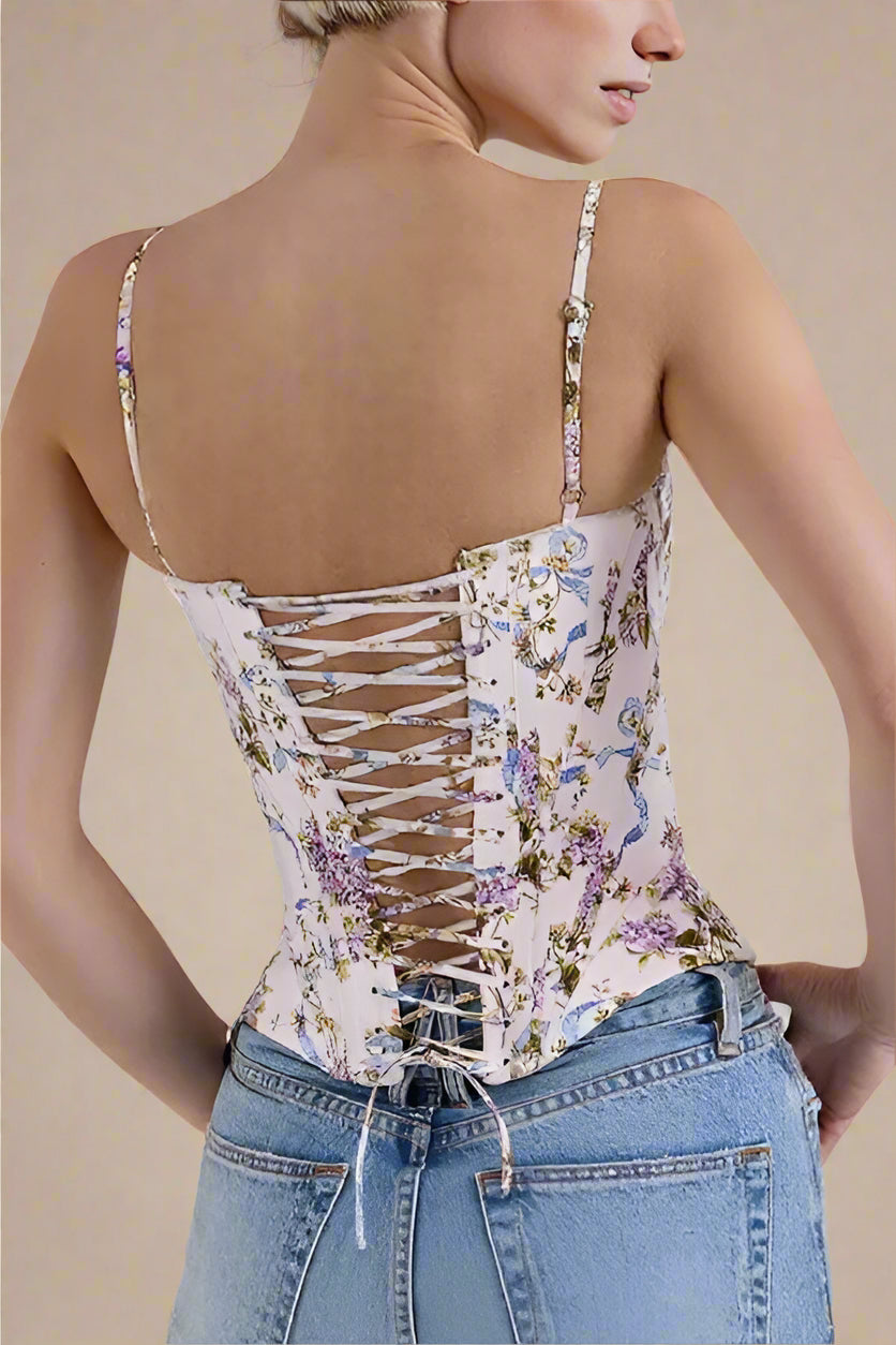 Woman wearing a figure flattering  Penny Corset Top - White Floral BODYCON COLLECTION Pty Ltd