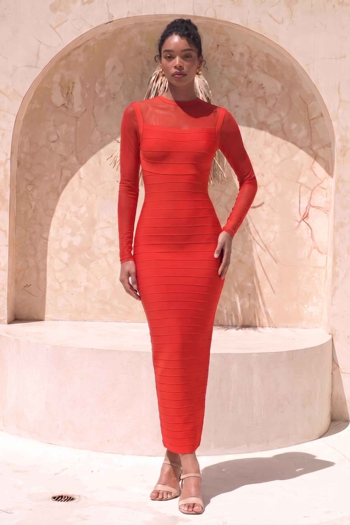 Woman wearing a figure flattering  Robin Long Sleeve Bandage Maxi Dress - Lipstick Red BODYCON COLLECTION Pty Ltd