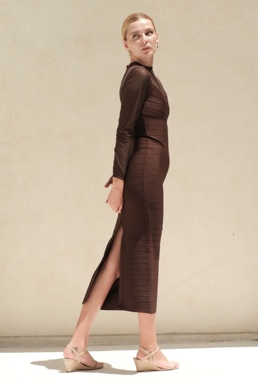 Woman wearing a figure flattering  Robin Long Sleeve Bandage Maxi Dress - Tan Brown BODYCON COLLECTION Pty Ltd