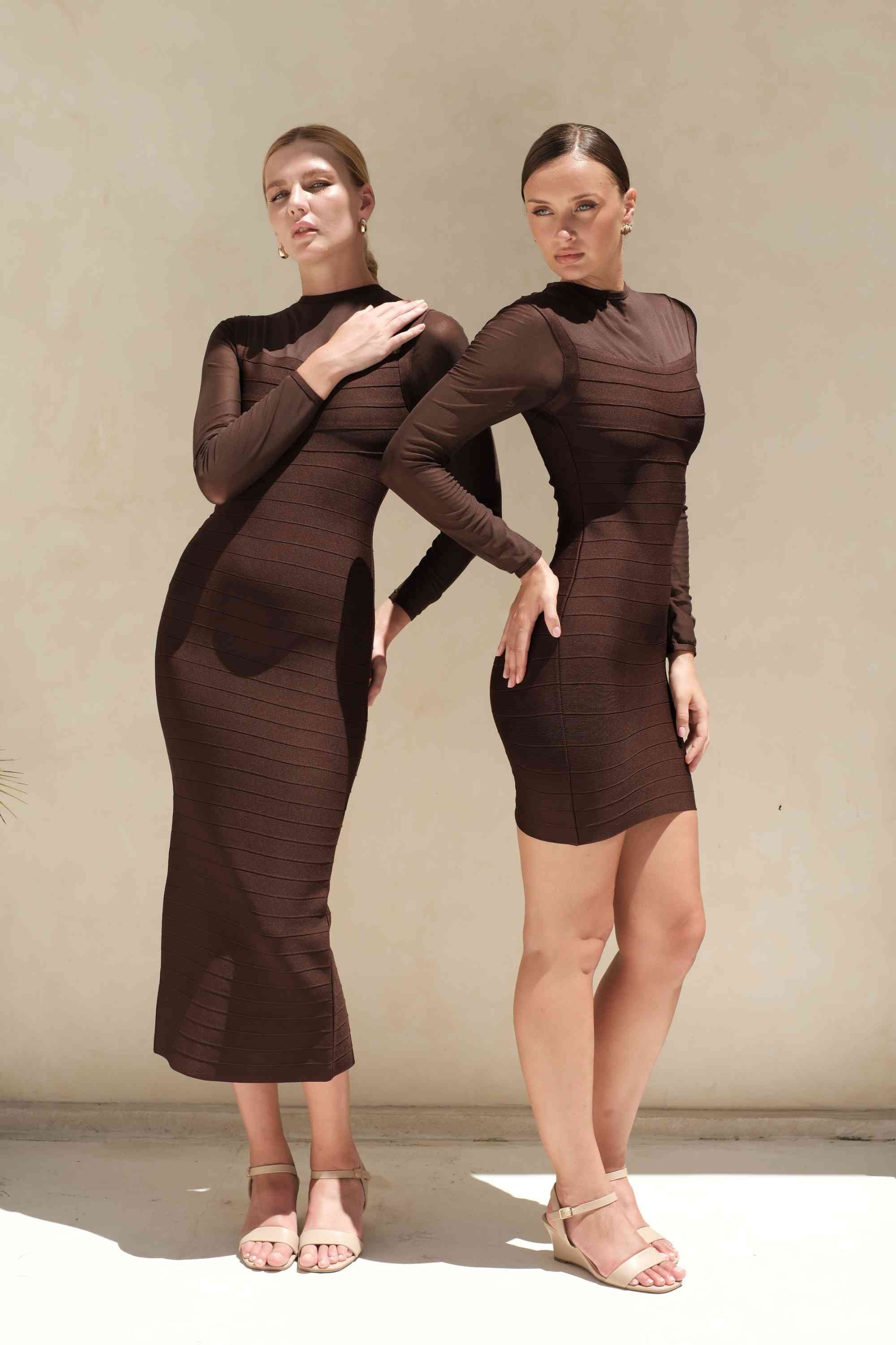 Woman wearing a figure flattering  Robin Long Sleeve Bandage Mini Dress - White Pearl BODYCON COLLECTION Pty Ltd