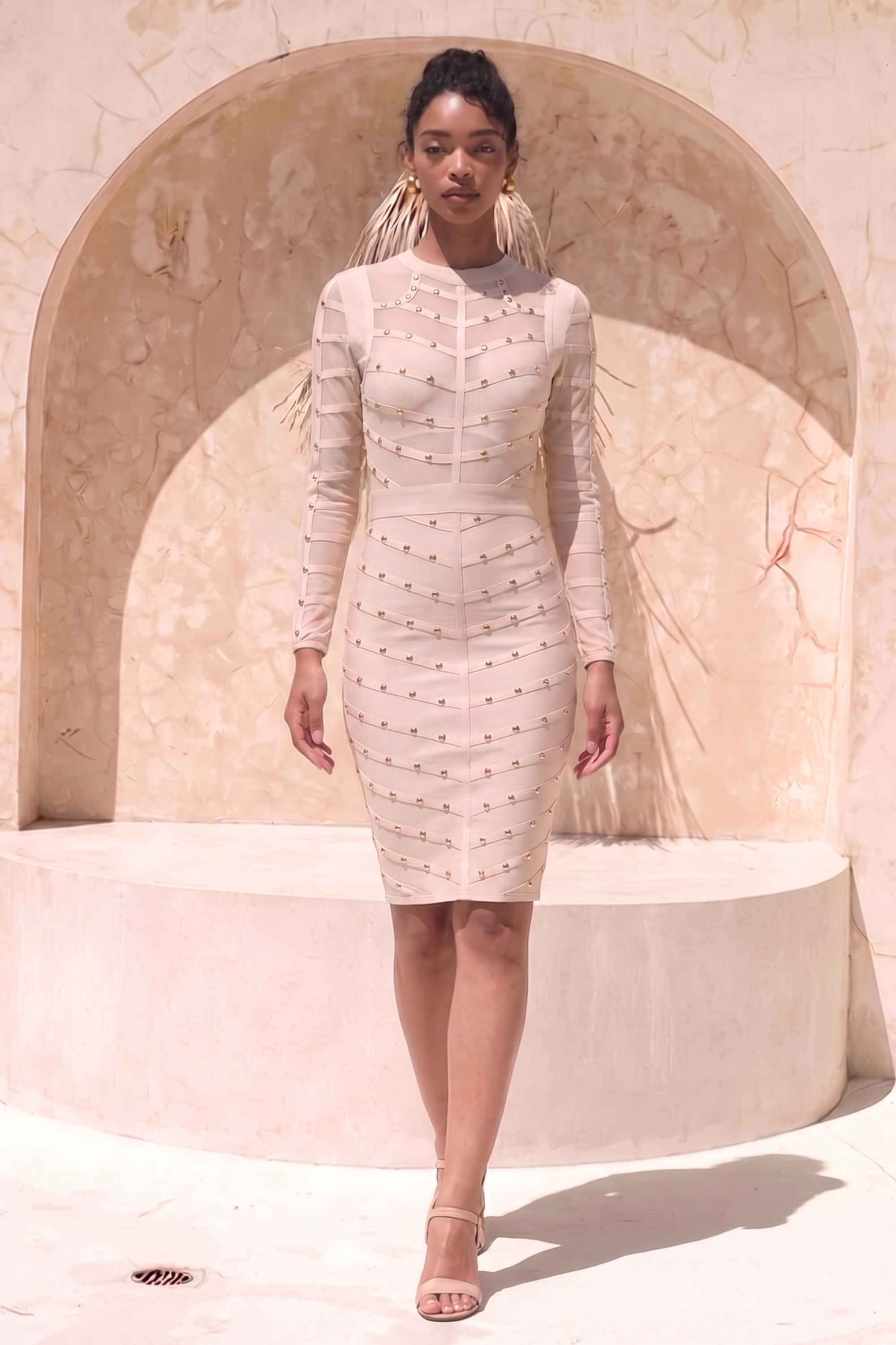 Woman wearing a figure flattering  Rosa Long Sleeve Bodycon Dress - Cream BODYCON COLLECTION