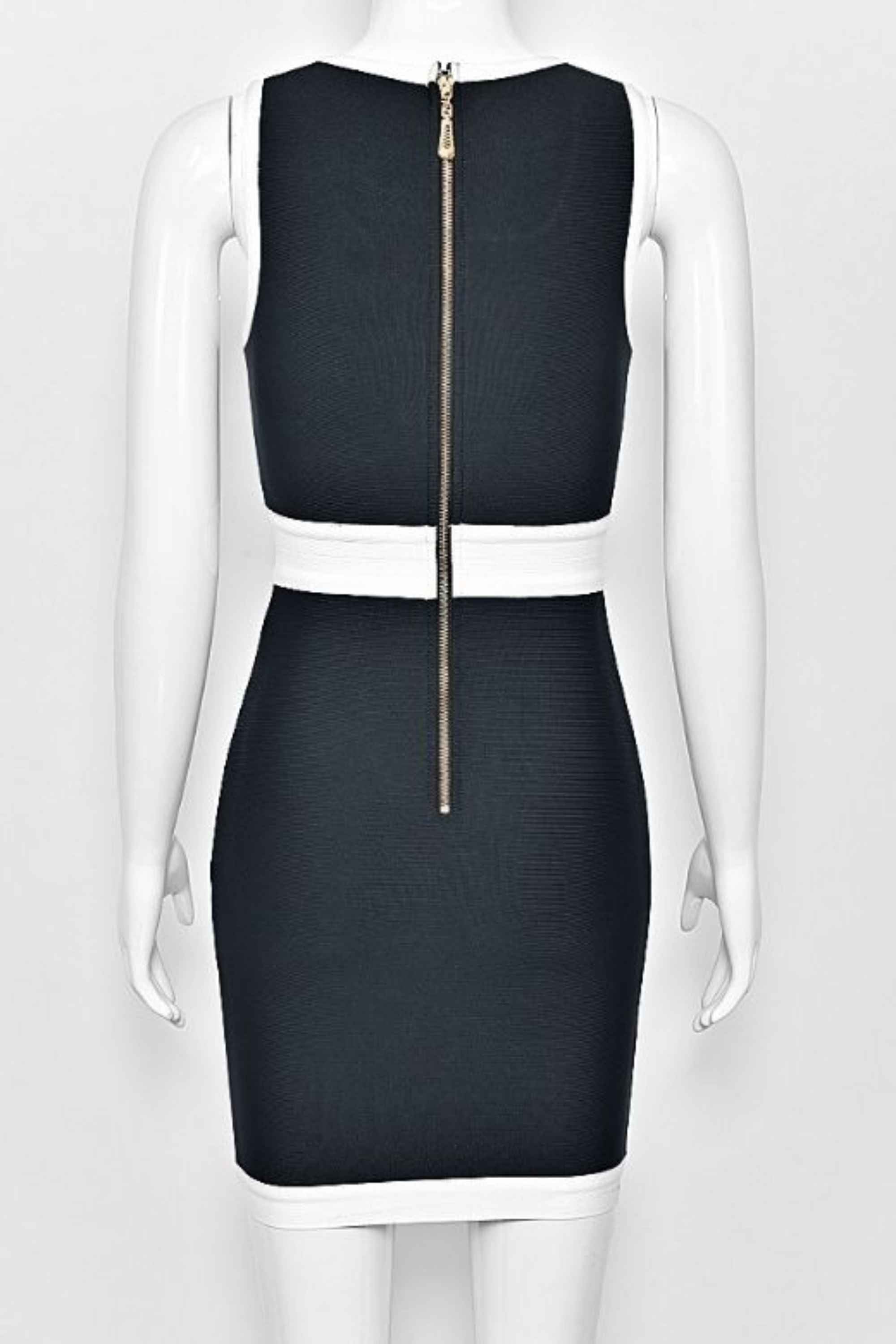 Woman wearing a figure flattering  Rosie Bodycon Dress - Classic Black BODYCON COLLECTION