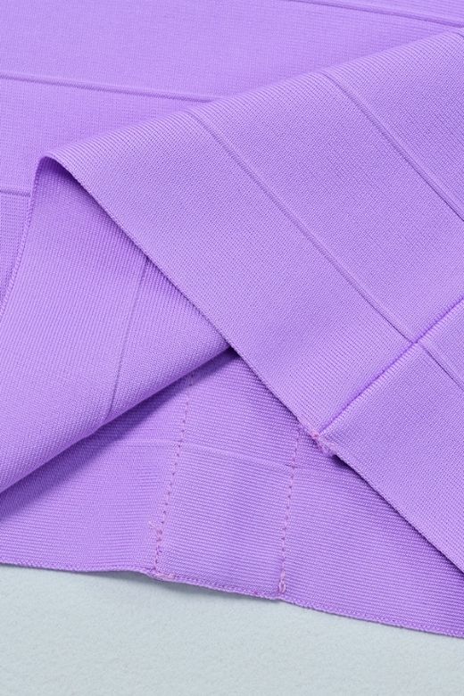 Woman wearing a figure flattering  Ruby Bandage Mini Dress - Violet Purple BODYCON COLLECTION