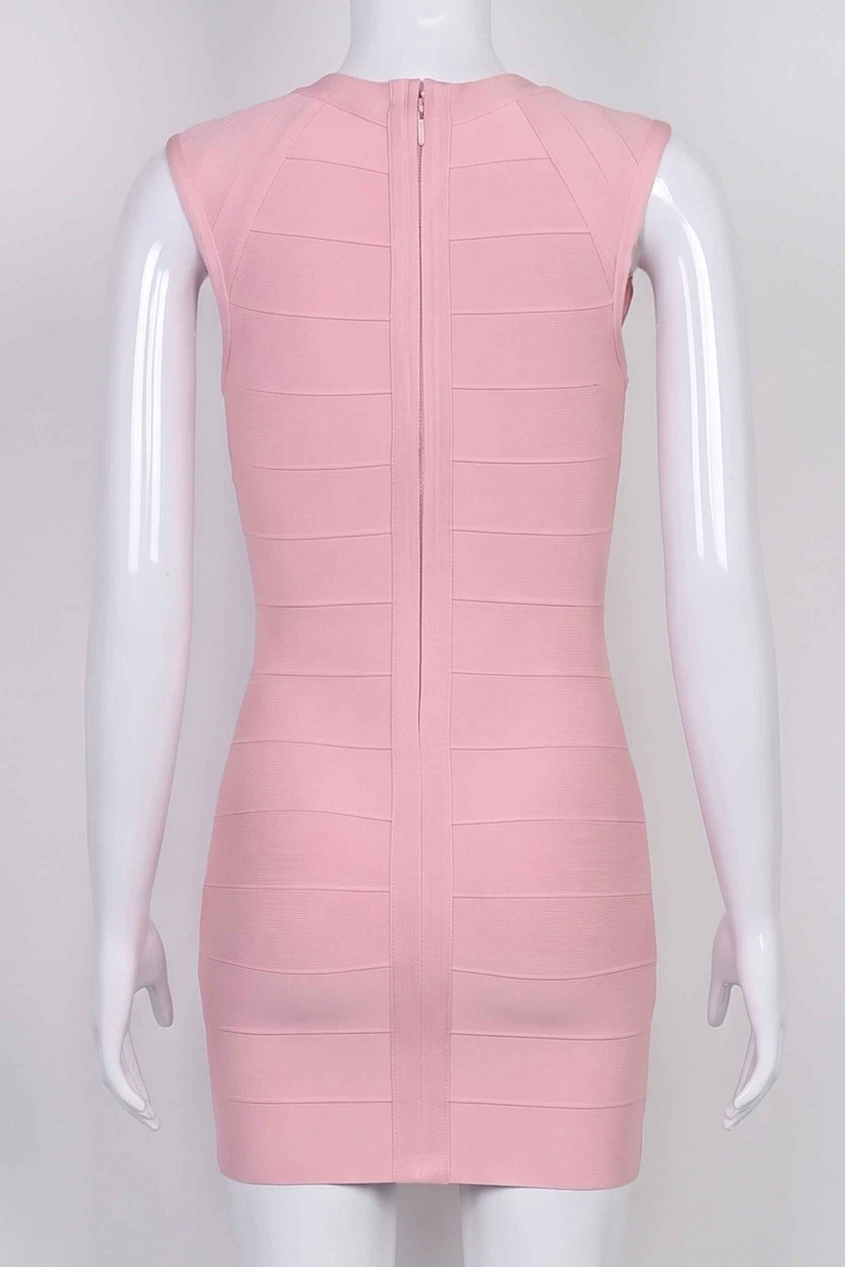 Woman wearing a figure flattering  Sabrina Bandage Mini Dress - Pale Pink BODYCON COLLECTION Pty Ltd