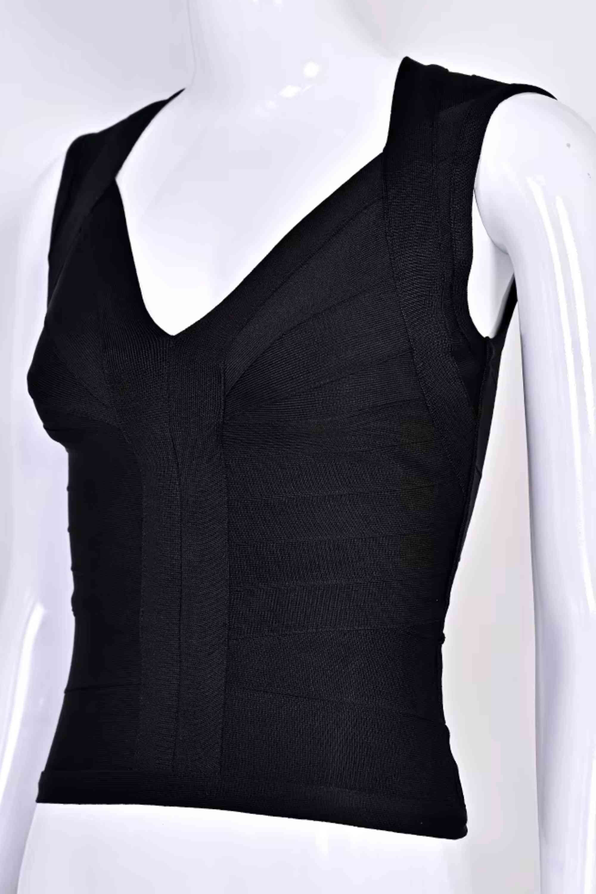 Woman wearing a figure flattering  Sabrina Bandage Top - Classic Black BODYCON COLLECTION Pty Ltd