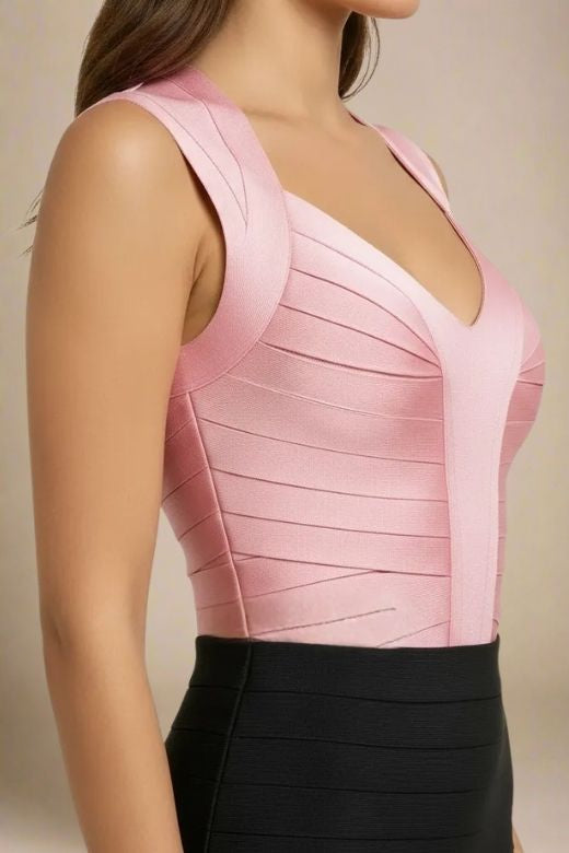 Woman wearing a figure flattering  Sabrina Bandage Top - Dusty Pink BODYCON COLLECTION Pty Ltd