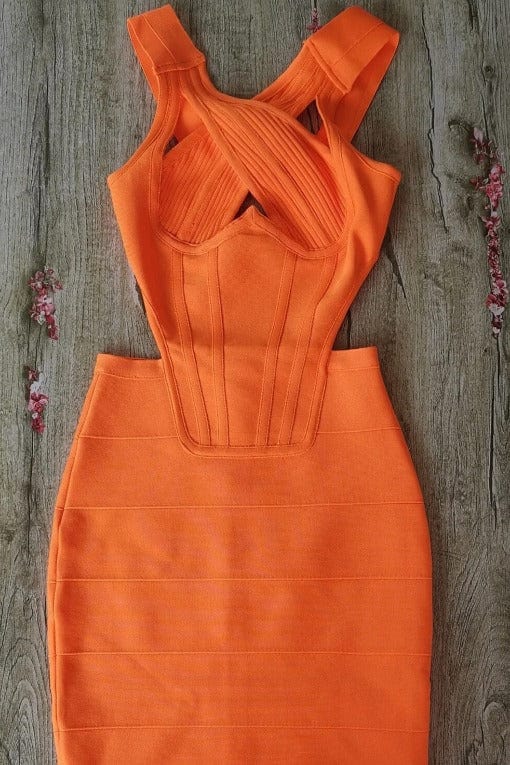 Woman wearing a figure flattering  Sasha Bandage Midi Dress - Apricot Orange BODYCON COLLECTION