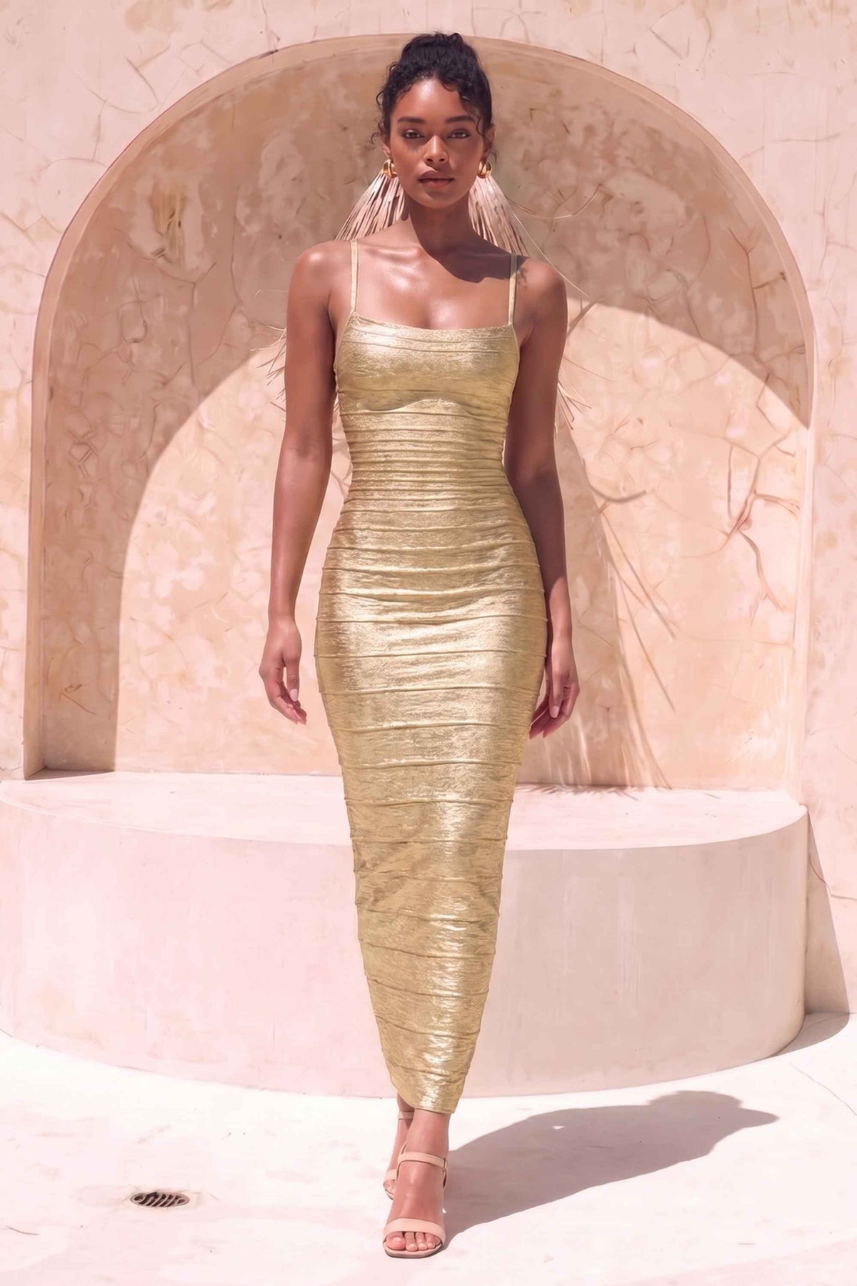 Woman wearing a figure flattering  Scarlett Bandage Maxi Dress - Gold BODYCON COLLECTION Pty Ltd