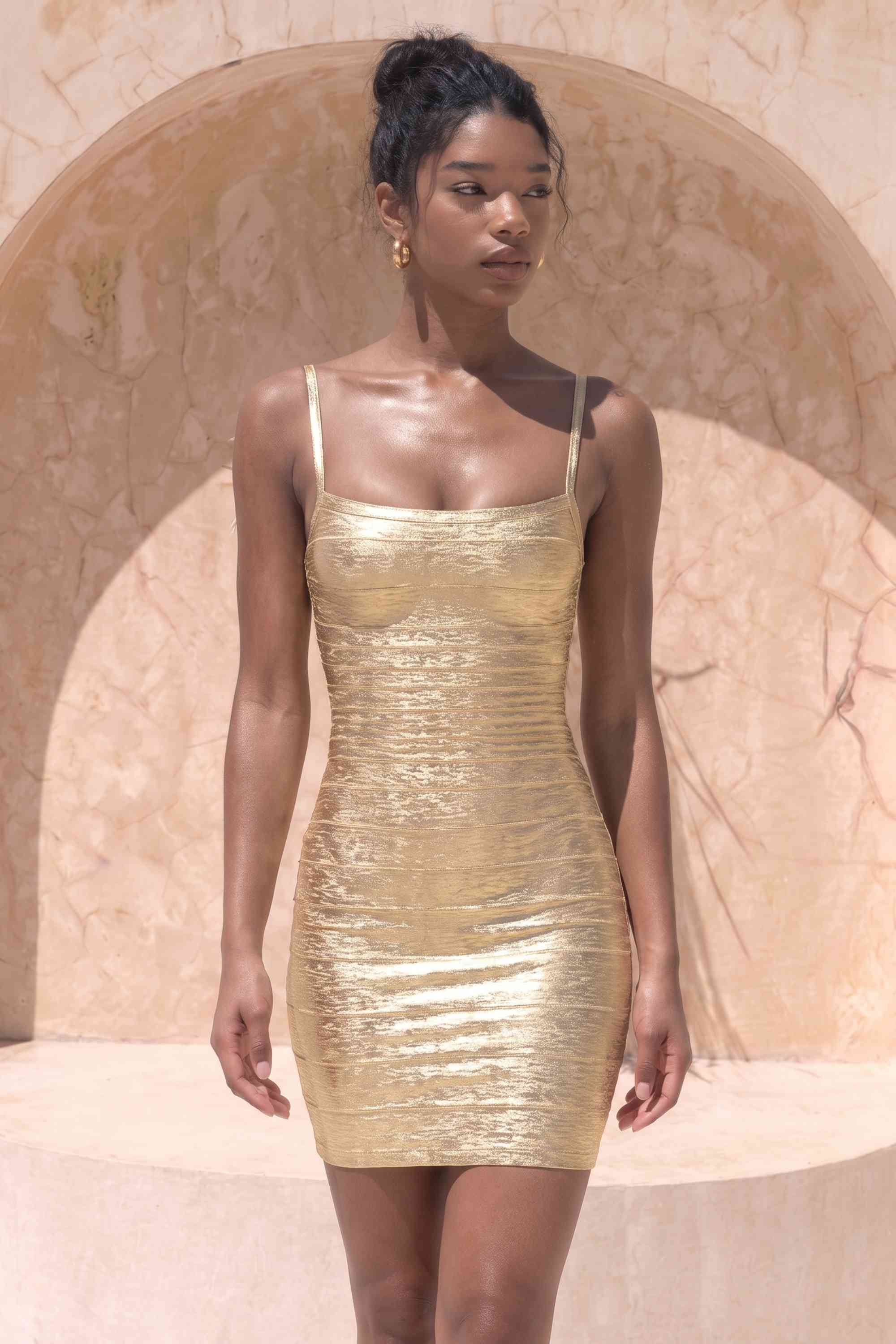 Woman wearing a figure flattering  Scarlett Bandage Mini Dress - Gold BODYCON COLLECTION Pty Ltd