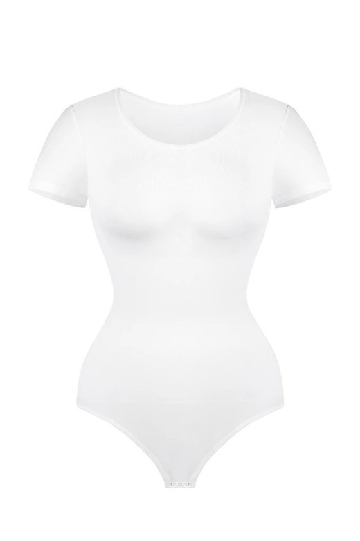Woman wearing a figure flattering  Short Sleeve One Piece Bodysuit Shapewear - Thong BODYCON COLLECTION