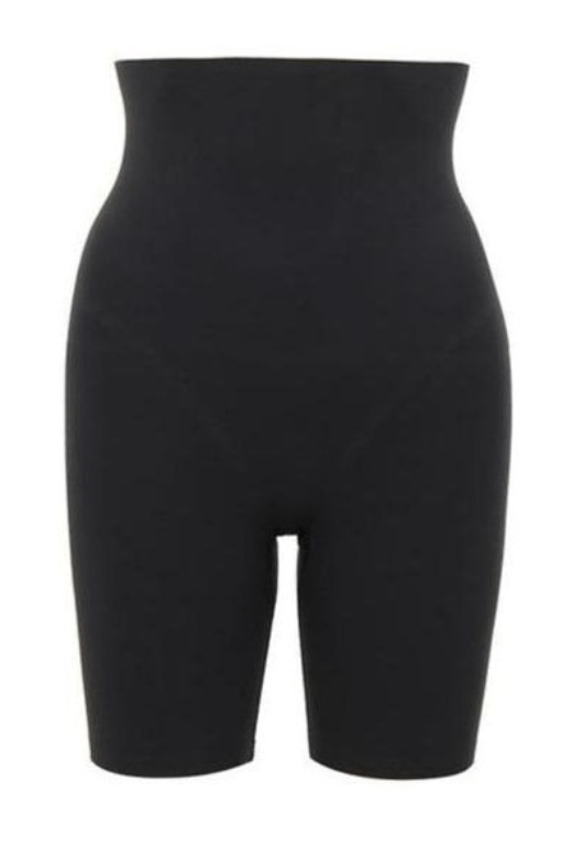 Woman wearing a figure flattering  Shorts Shapewear - Mid Thigh Bodycon Collection