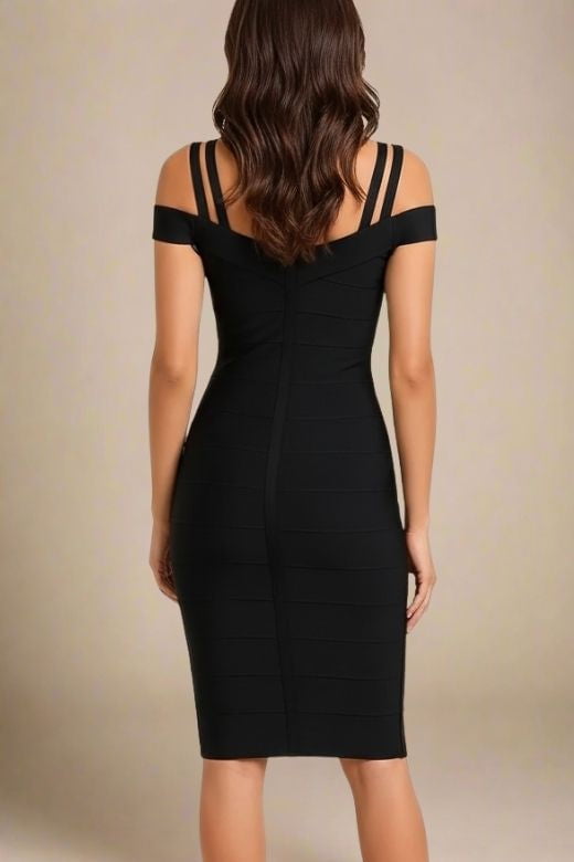 Woman wearing a figure flattering  Sia Bandage Dress - Classic Black Bodycon Collection