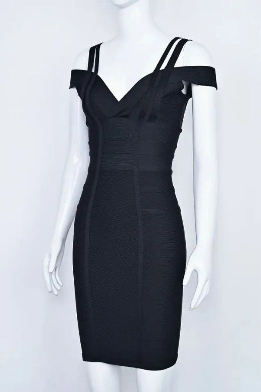 Woman wearing a figure flattering  Sia Bandage Dress - Classic Black Bodycon Collection