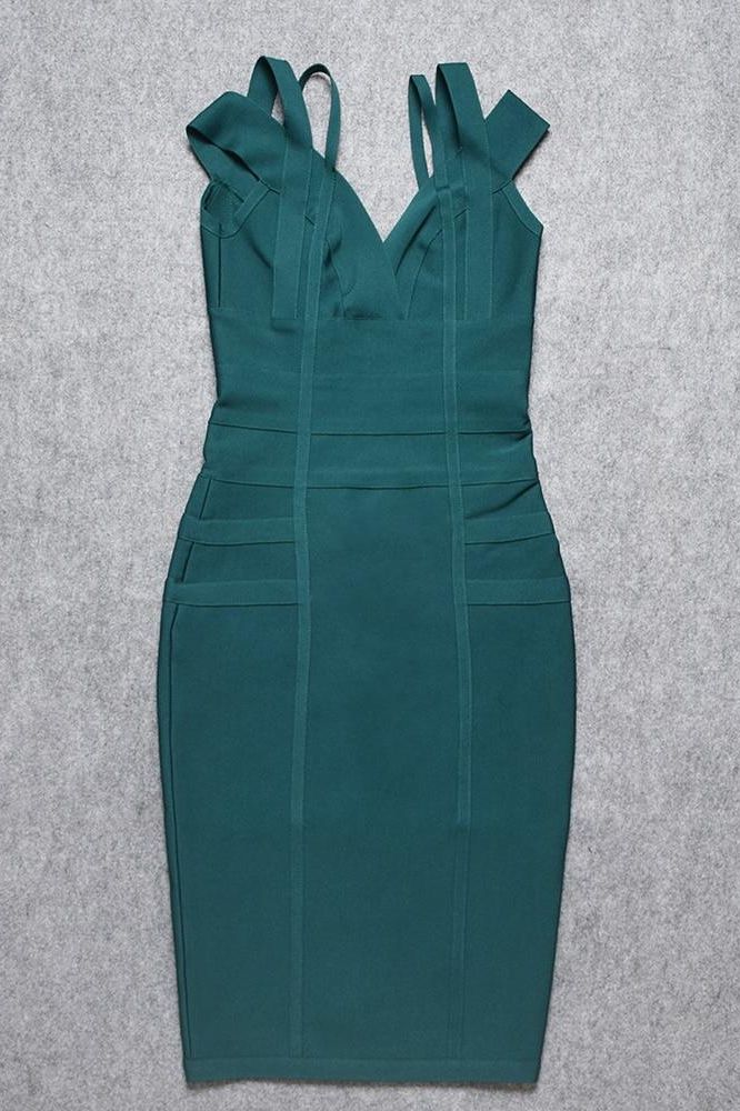 Woman wearing a figure flattering  Sia Bandage Dress - Emerald Green Bodycon Collection