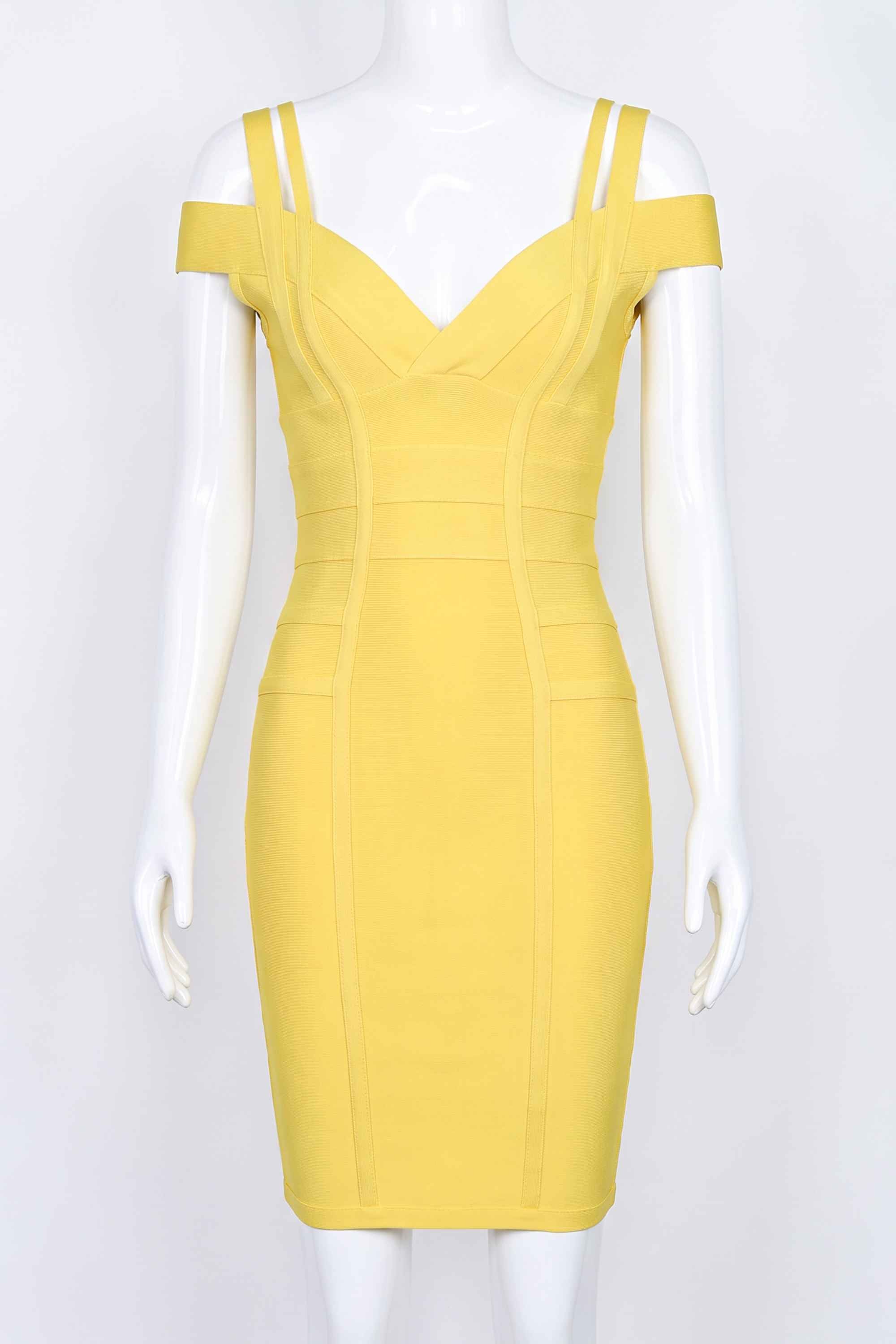 Woman wearing a figure flattering  Sia Bandage Dress - Sun Yellow Bodycon Collection