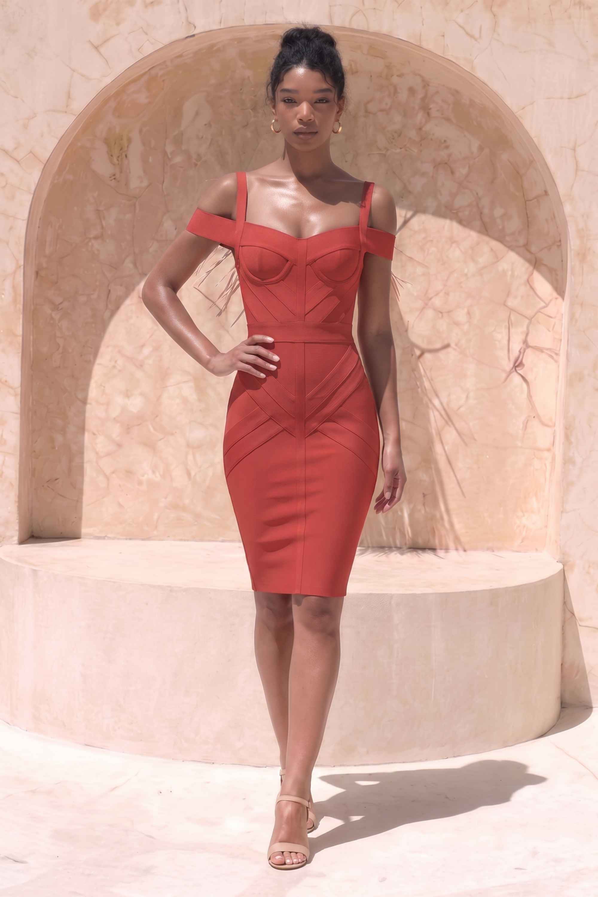 Woman wearing a figure flattering  Sophia Bandage Dress - Lipstick Red Bodycon Collection