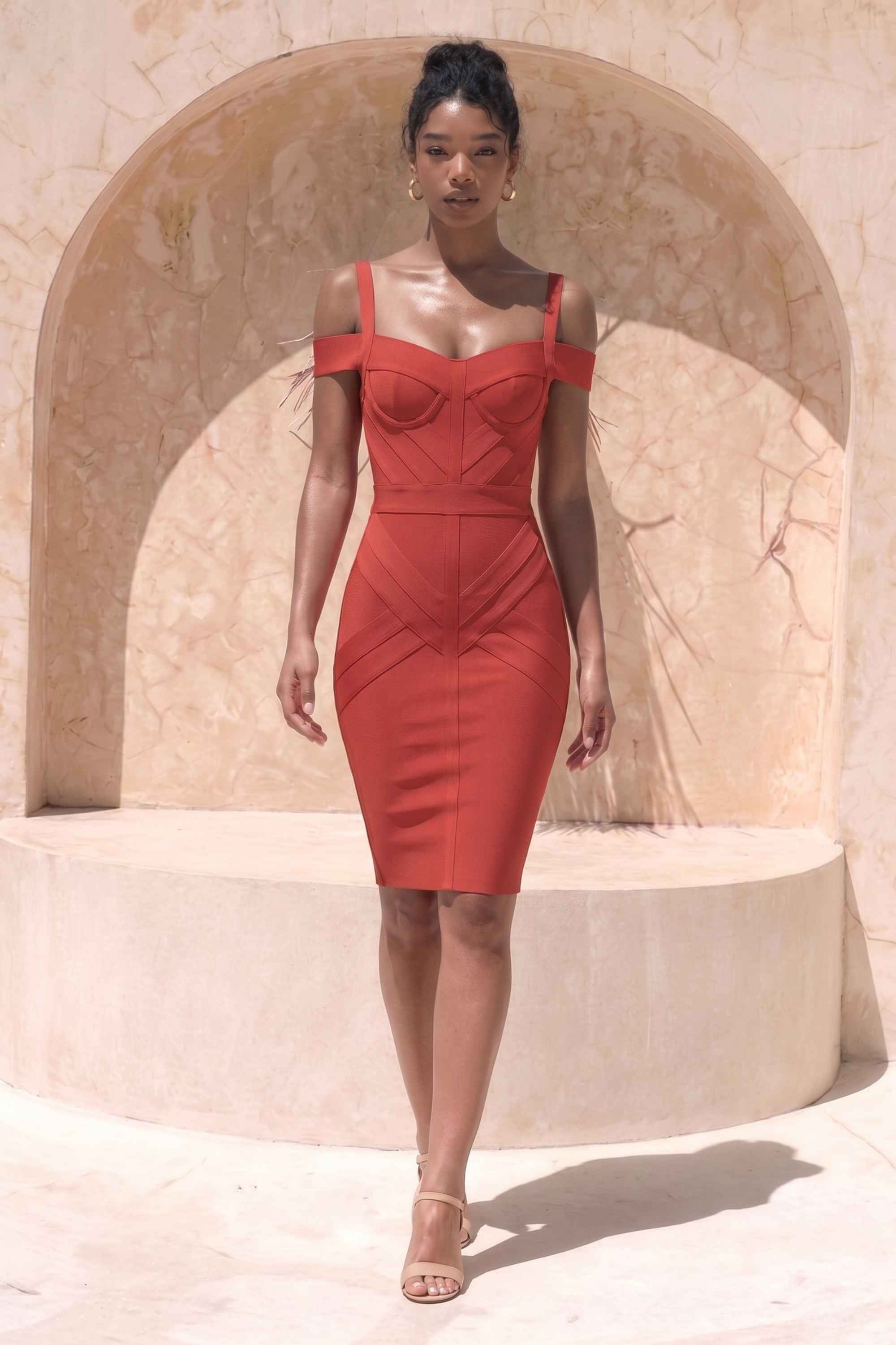 Woman wearing a figure flattering  Sophia Bandage Dress - Lipstick Red Bodycon Collection