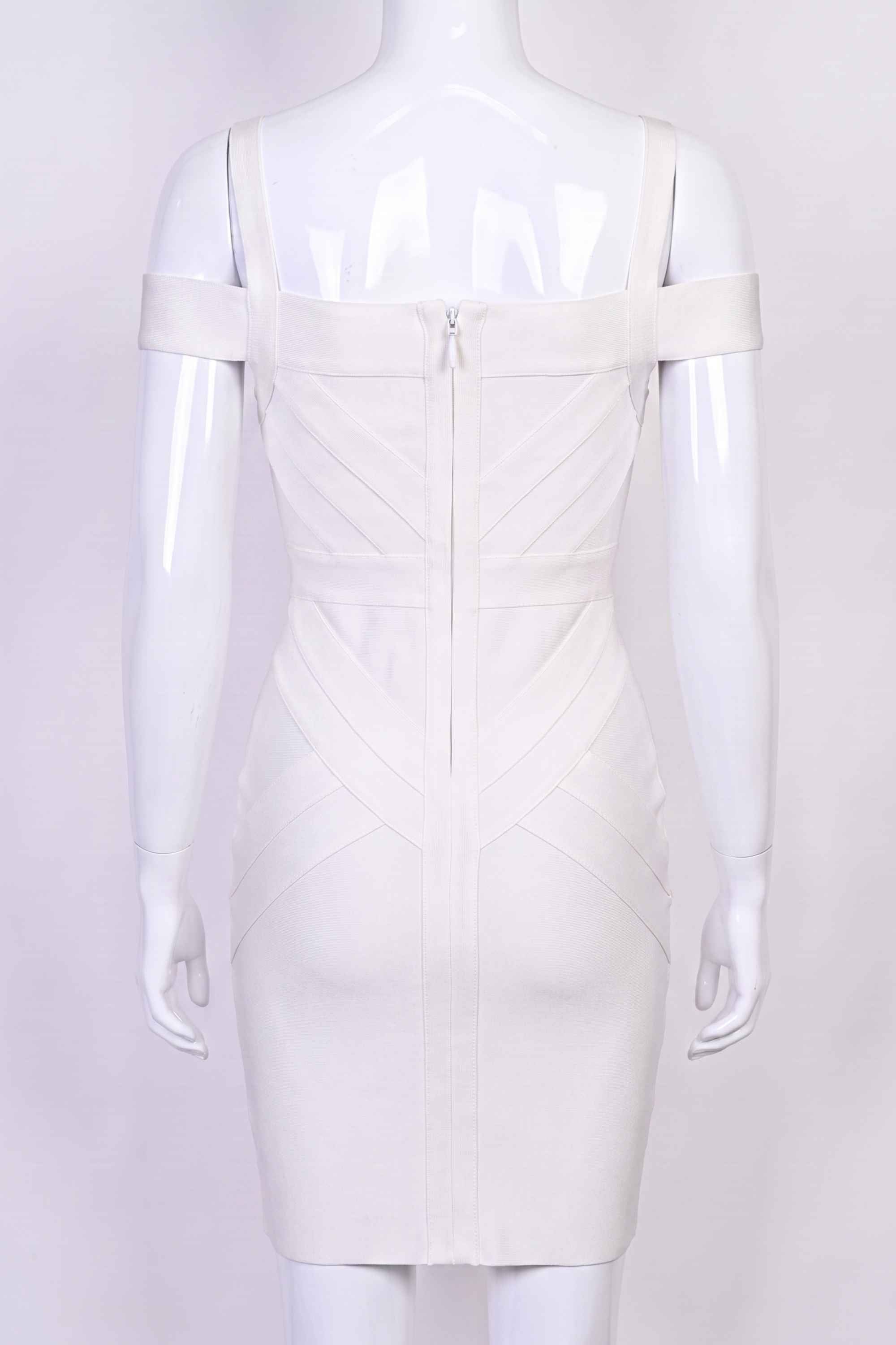Woman wearing a figure flattering  Sophia Bandage Dress - Pearl White Bodycon Collection