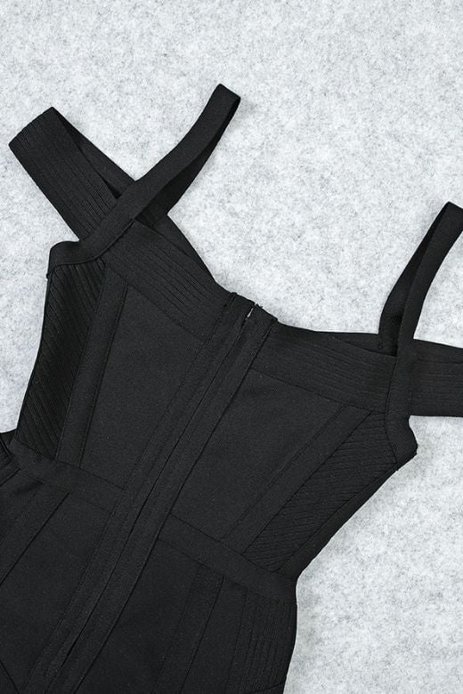 Woman wearing a figure flattering  Sophia Bandage Mini Dress - Classic Black Bodycon Collection