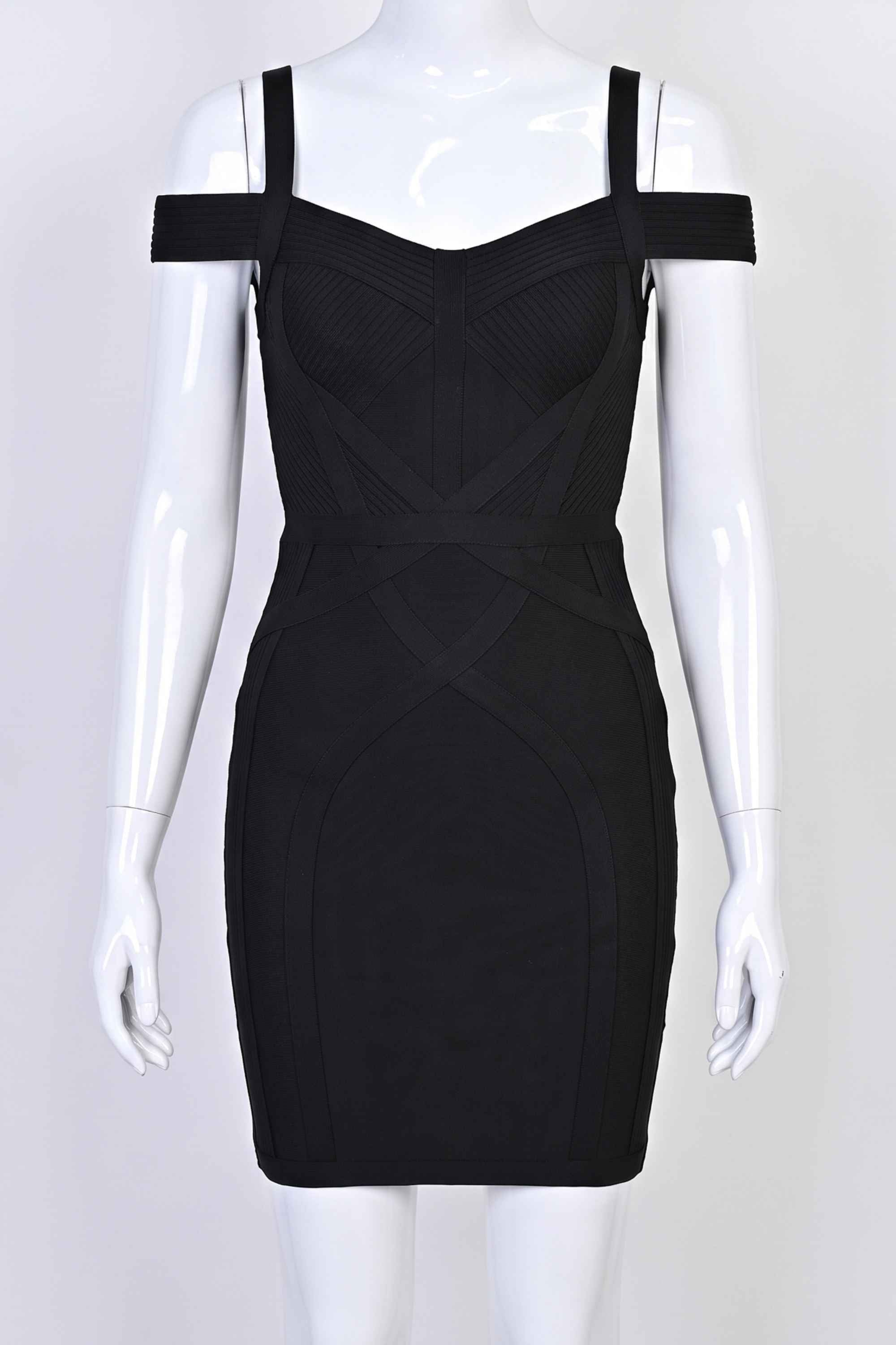Woman wearing a figure flattering  Sophia Bandage Mini Dress - Classic Black Bodycon Collection