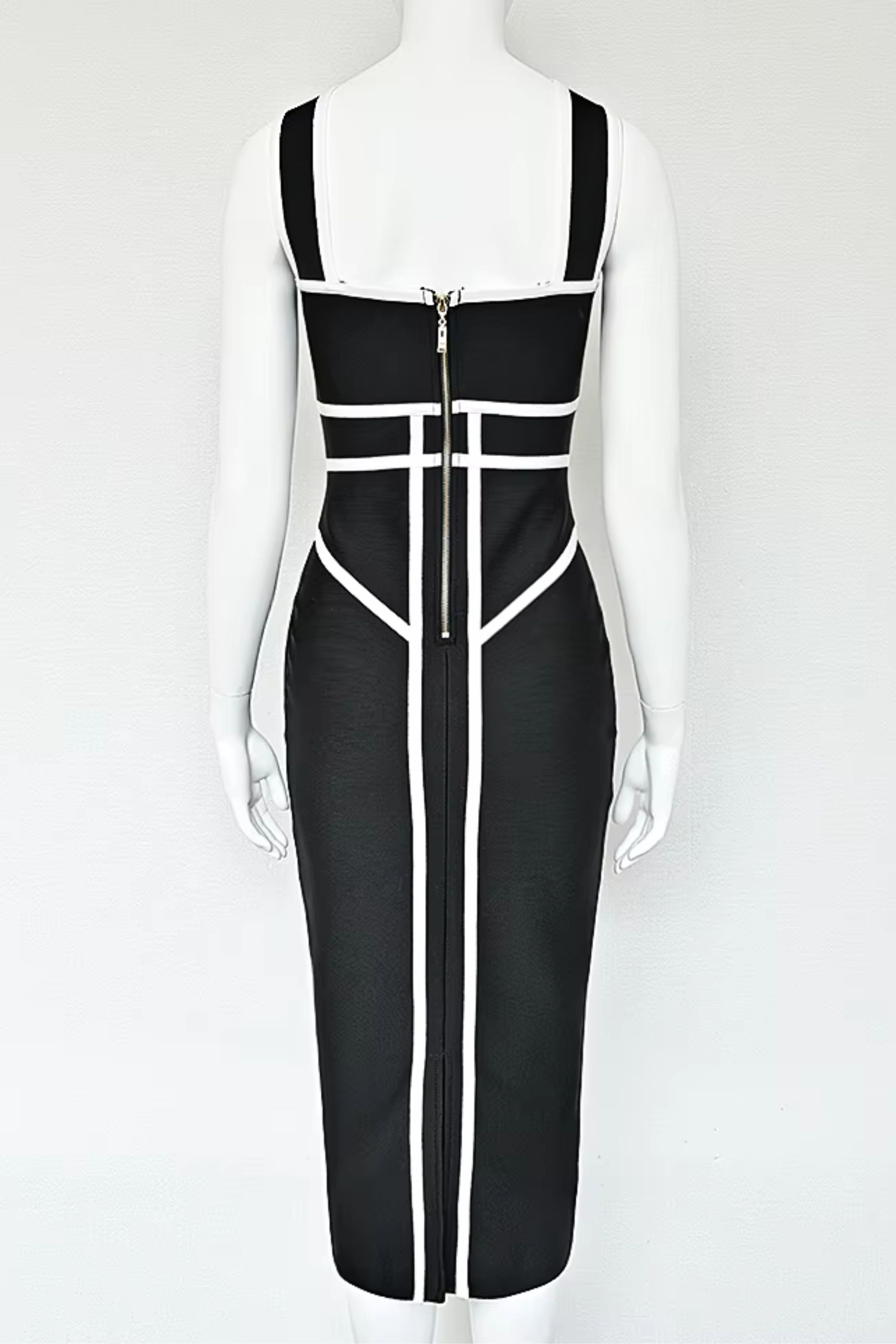 Woman wearing a figure flattering  Suki Bandage Midi Dress - Classic Black BODYCON COLLECTION