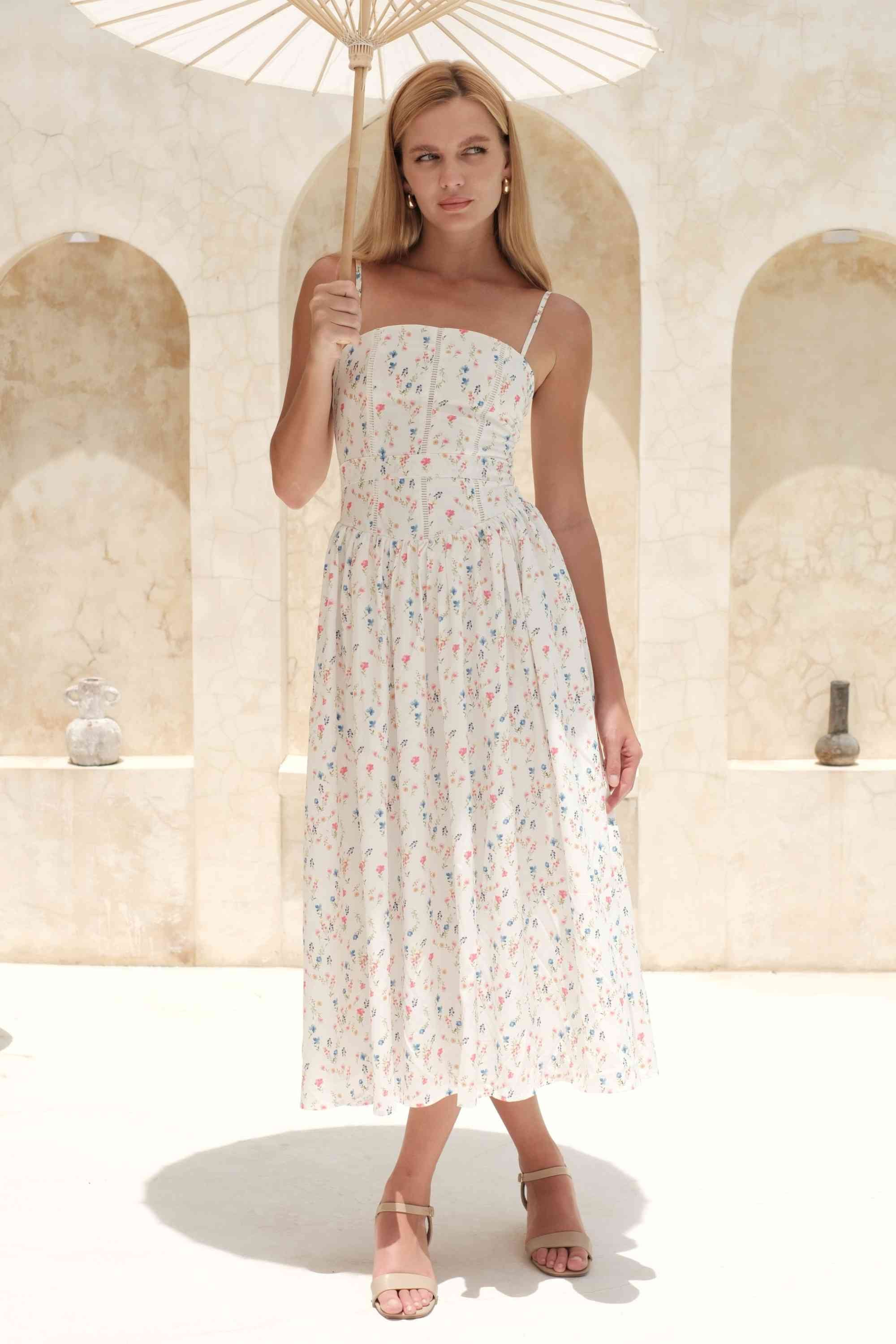 Woman wearing a figure flattering  Tasmin Midi Dress - White Print BODYCON COLLECTION