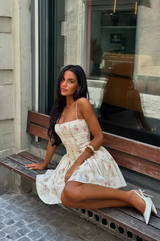 Woman wearing a figure flattering  Tasmin Mini Dress - Cream BODYCON COLLECTION