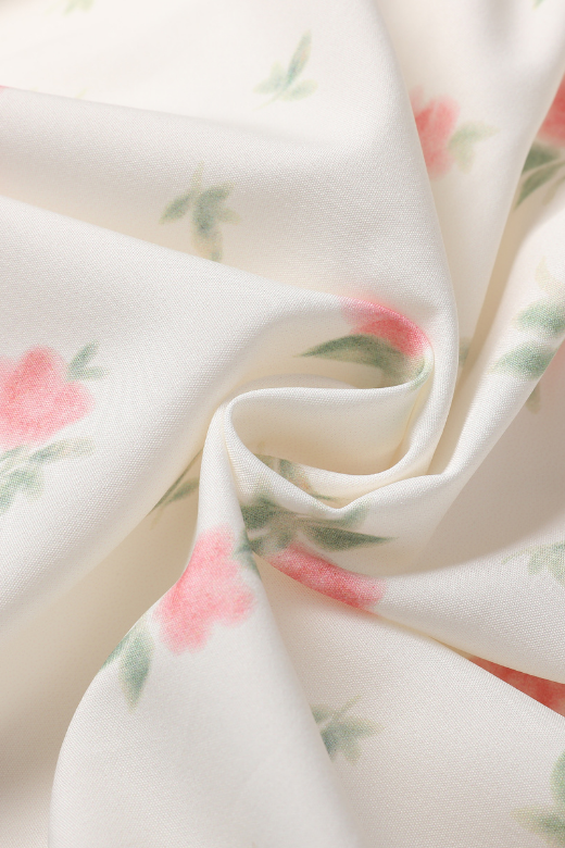 Woman wearing a figure flattering  Tasmin Mini Dress - Cream BODYCON COLLECTION