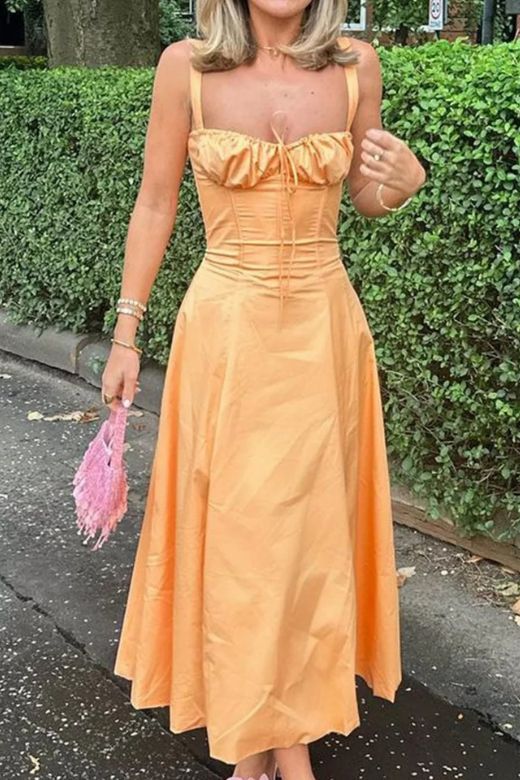 Woman wearing a figure flattering  Taylor Bodycon Day Midi Dress - Pumpkin Orange BODYCON COLLECTION