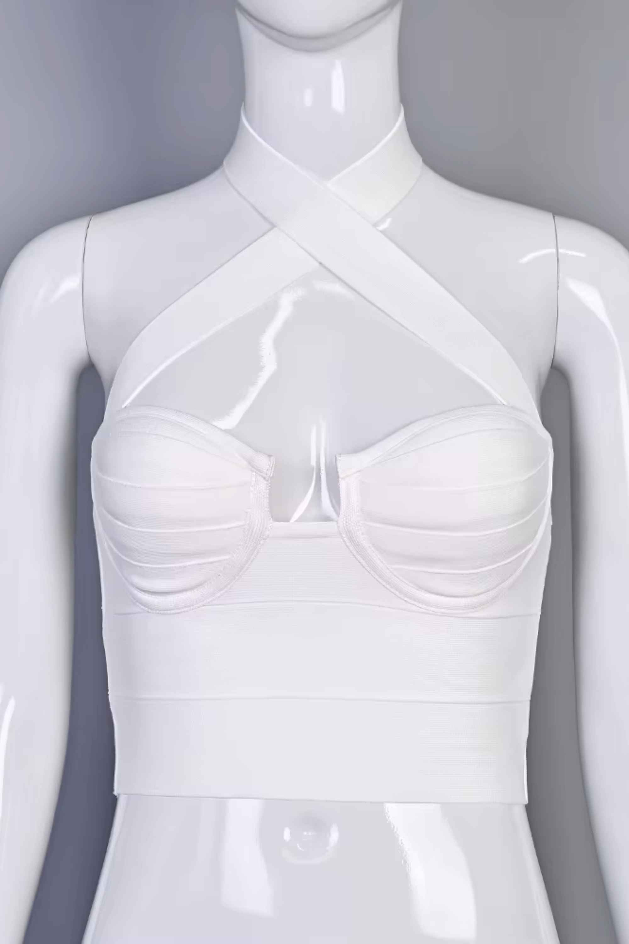 Woman wearing a figure flattering  Willow Bandage Crop Top - White Pearl BODYCON COLLECTION Pty Ltd