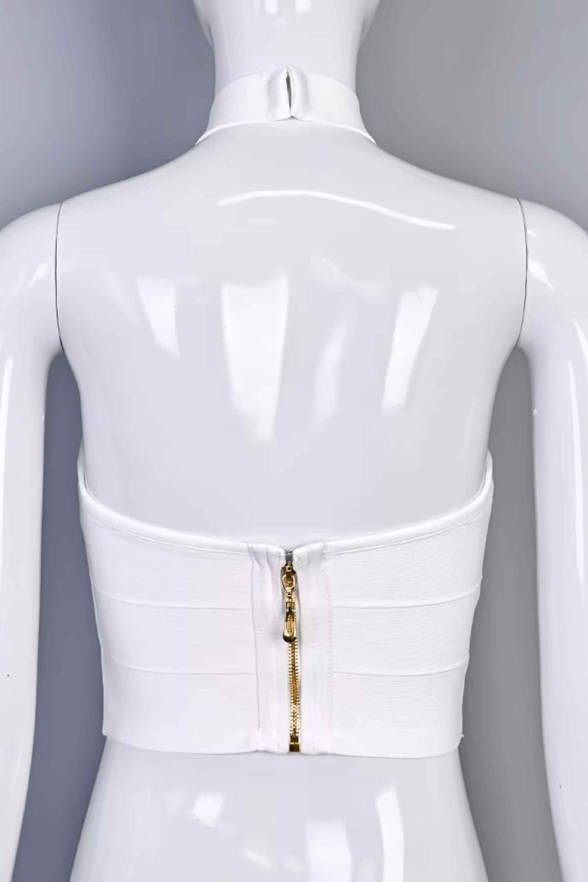 Woman wearing a figure flattering  Willow Bandage Crop Top - White Pearl BODYCON COLLECTION Pty Ltd