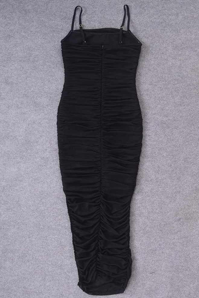 Woman wearing a figure flattering  Zoe Bodycon Wrap Maxi Dress - Classic Black Bodycon Collection